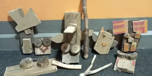 kreative Gesichter und Figuren aus Holz